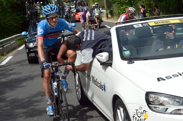 David Zabriskie (Garmin-Sharp) gets some help on stage 13 of the 2012 Tour de France