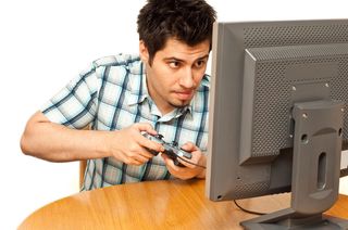 guy playing a video game