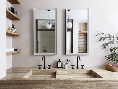 A bathroom with double mirror