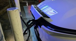 The Chery Omoda E5 charging at a public station