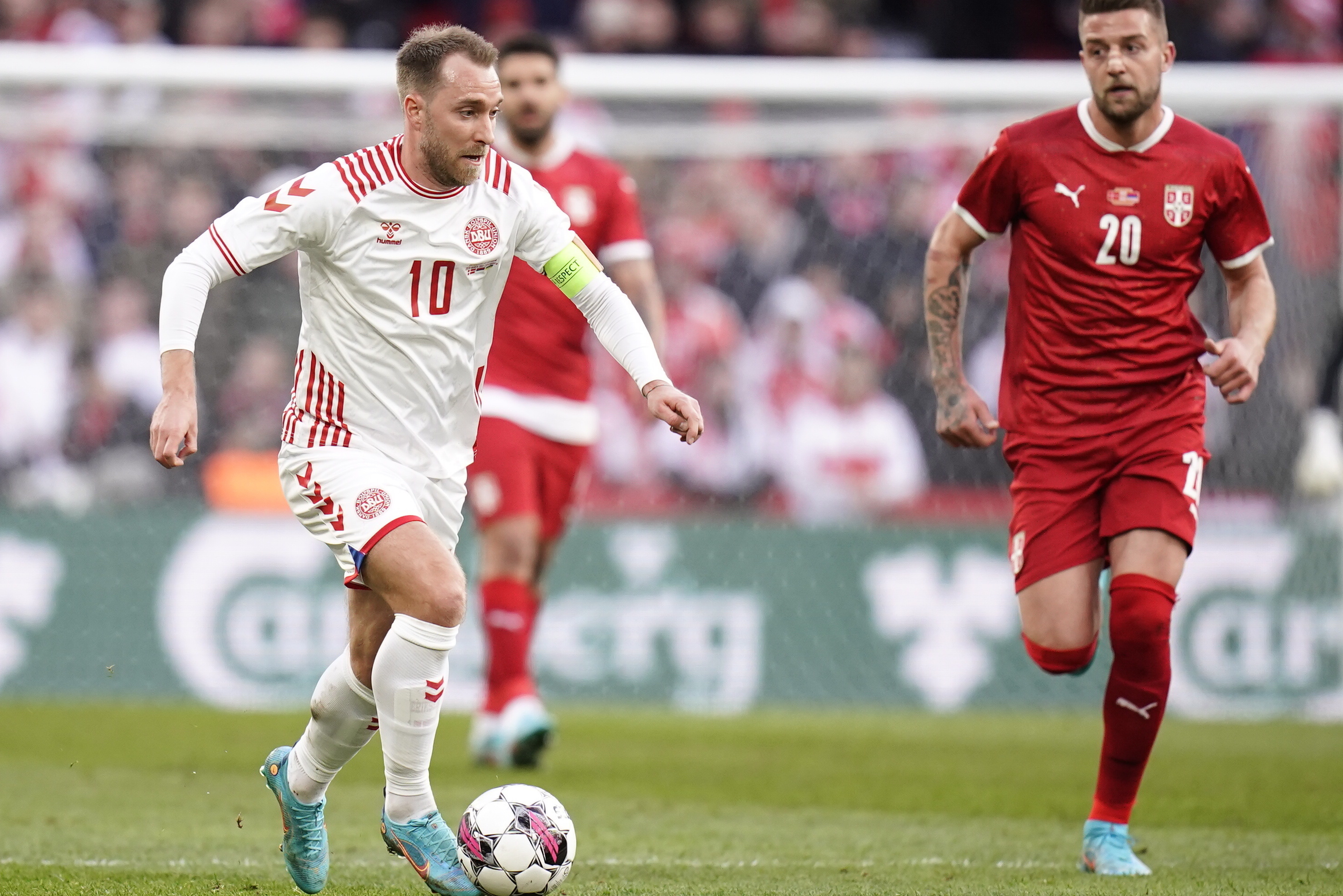 Denmark midfielder Christian Eriksen (left)
