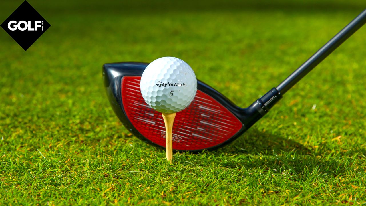 A TaylorMade driver lining up a TaylorMade golf ball on a tee at Woburn Golf Club