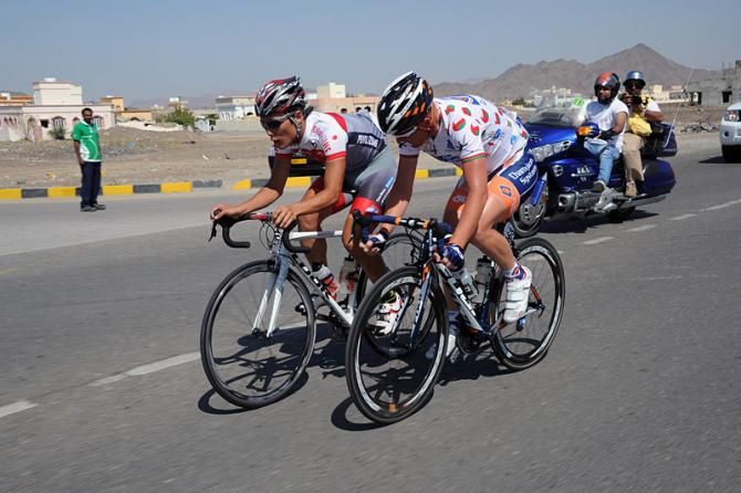 Tomohiro Kinoshita (Japan) and most aggressive rider jersey holder Bobbie Traksel (Champion System) on the attack.