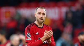  Christian Eriksen of Manchester United applauds the fans following the team’s defeat during the Premier League match between Manchester United and Fulham FC at Old Trafford on February 24, 2024