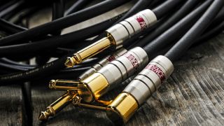 Best Guitar Cables: Closeup of some Evidence Audio guitar cables with straight and angled jack plugs 