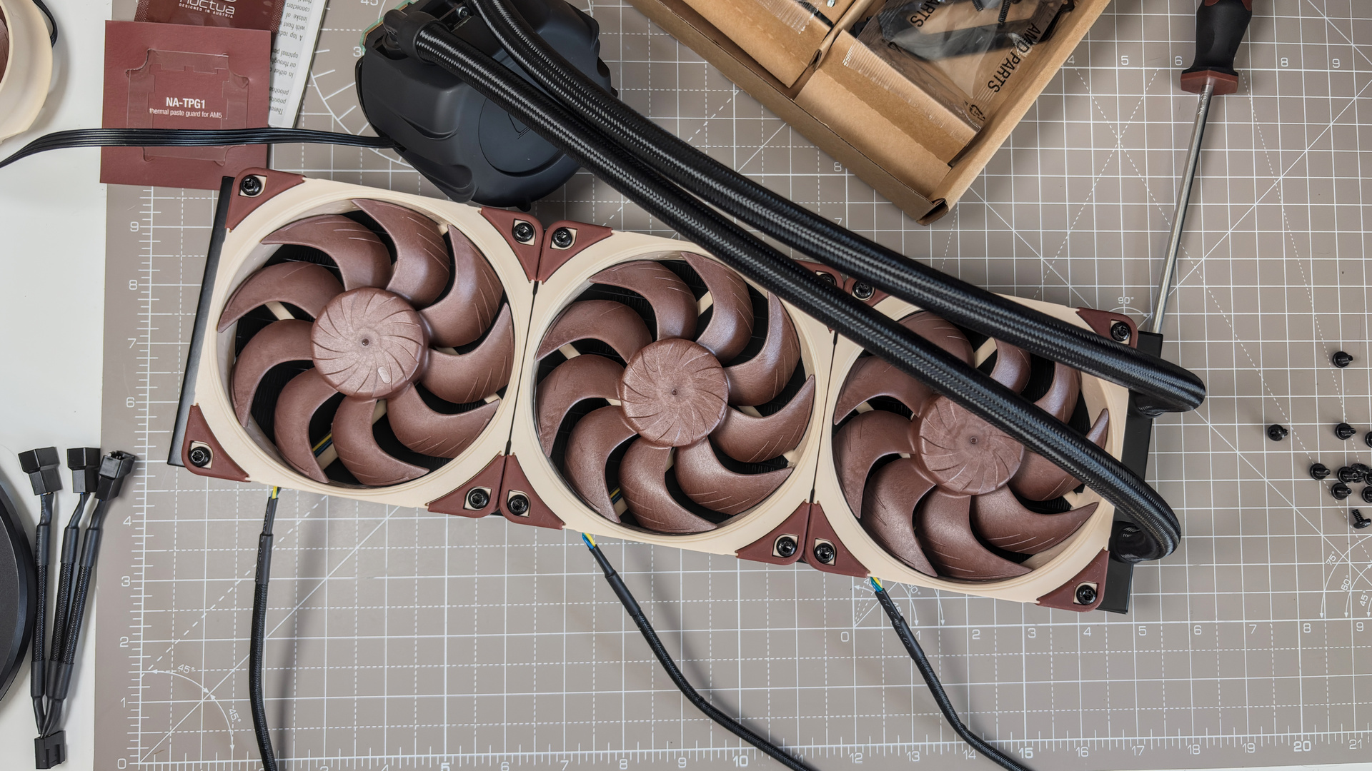 A Noctua NL-LC1 liquid cooler being installed on a test bench for testing.