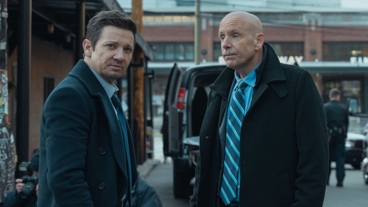 L-R: Jeremy Renner as Mike McLusky and Hugh Dillon as Ian Ferguson in episode 5, season 3 of Mayor of Kingstown streaming on Paramount+, 2024.