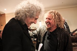 "Who does your hair, the council?!" Brian May and Hagar share a joke backstage at Brixton