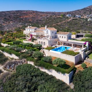 aerial view of villa and garden and pool