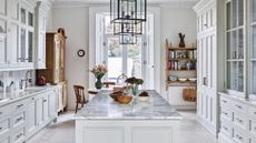 Chef's style white galley kitchen