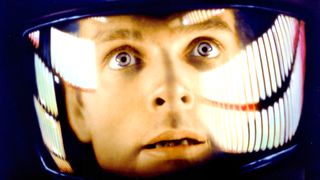 Keir Dullea as Dr David Bowman wearing a space helmet during one of the best movies on HBO Max, 2001: A Space Odyssey.