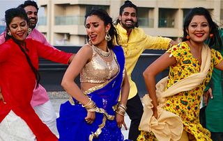 Bollywood: The World's Biggest Film Industry - shows Anita Rani dancing