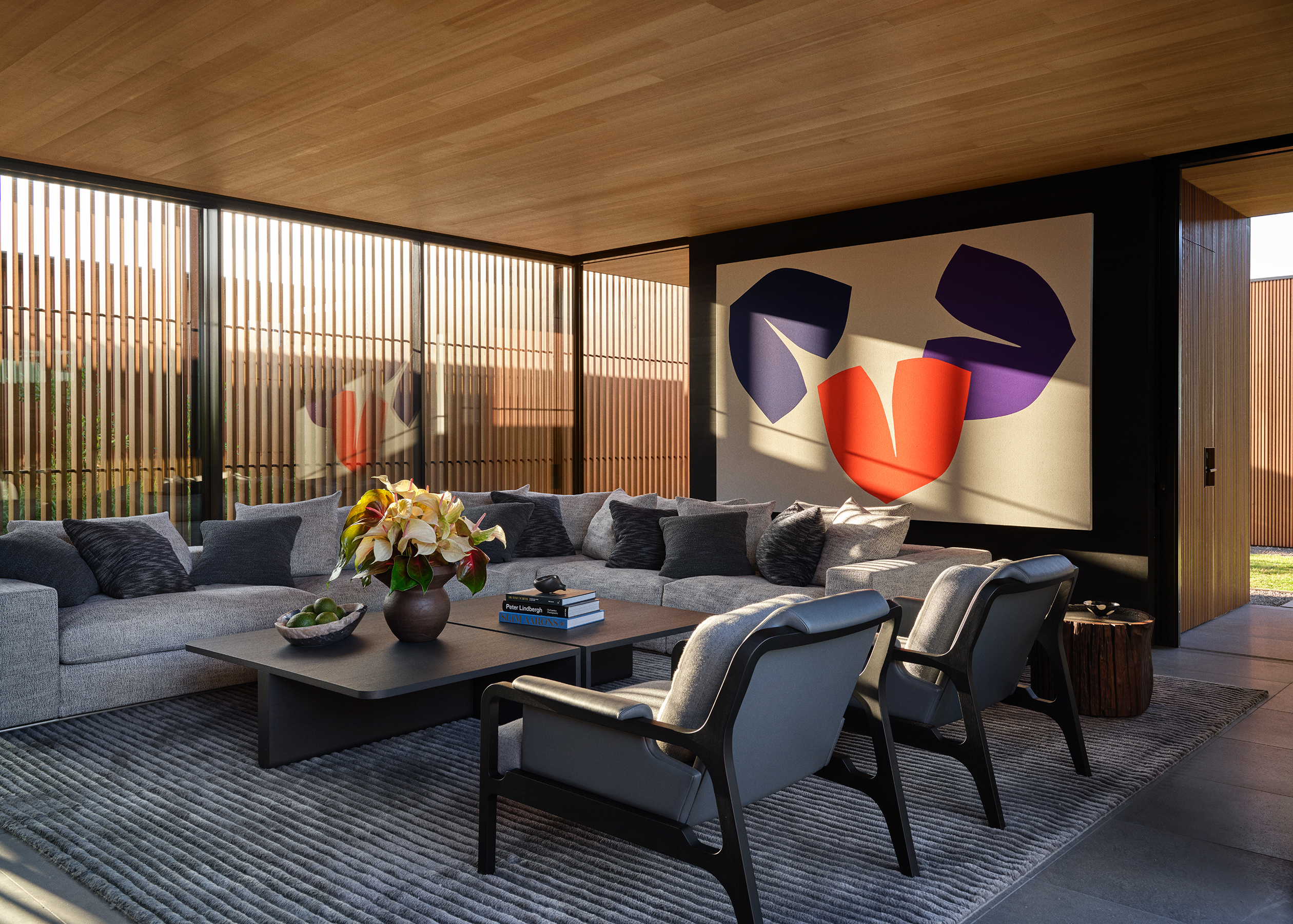 Hawaii house by oslon kundig and leverone design by the sea, tall ceilings, contemporary spaces and art work, and lots of glazing