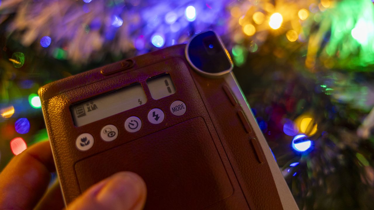 The party mode activated on the Fujifilm Instax Mini 90 Neo Classic