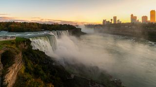 Niagara Falls Waterfall and Colorful Sky at Dawn in New York, USA