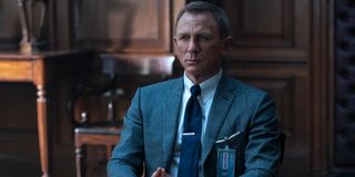 Daniel Craig sits stoically in M's office in No Time To Die.