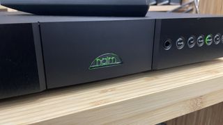 Naim Nait XS3 on wooden rack