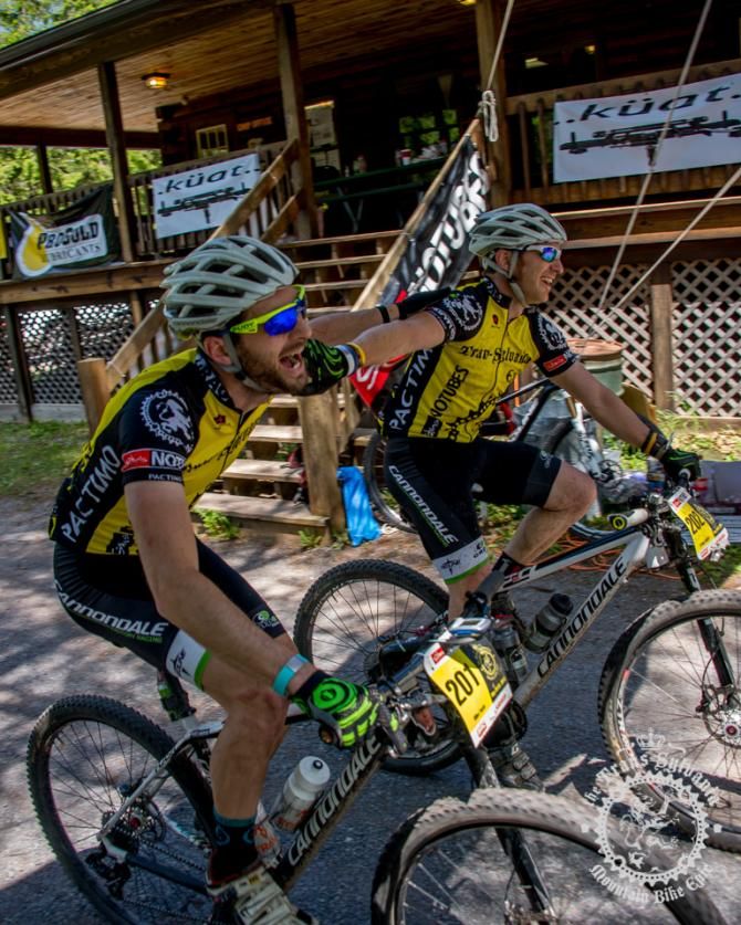 Mike Festa and Craig Lebair roll across the finishing line of Stage 7