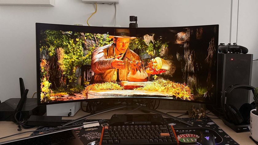 Acer Predator X39 OLED gaming monitor on a desktop with a PC game on the screen