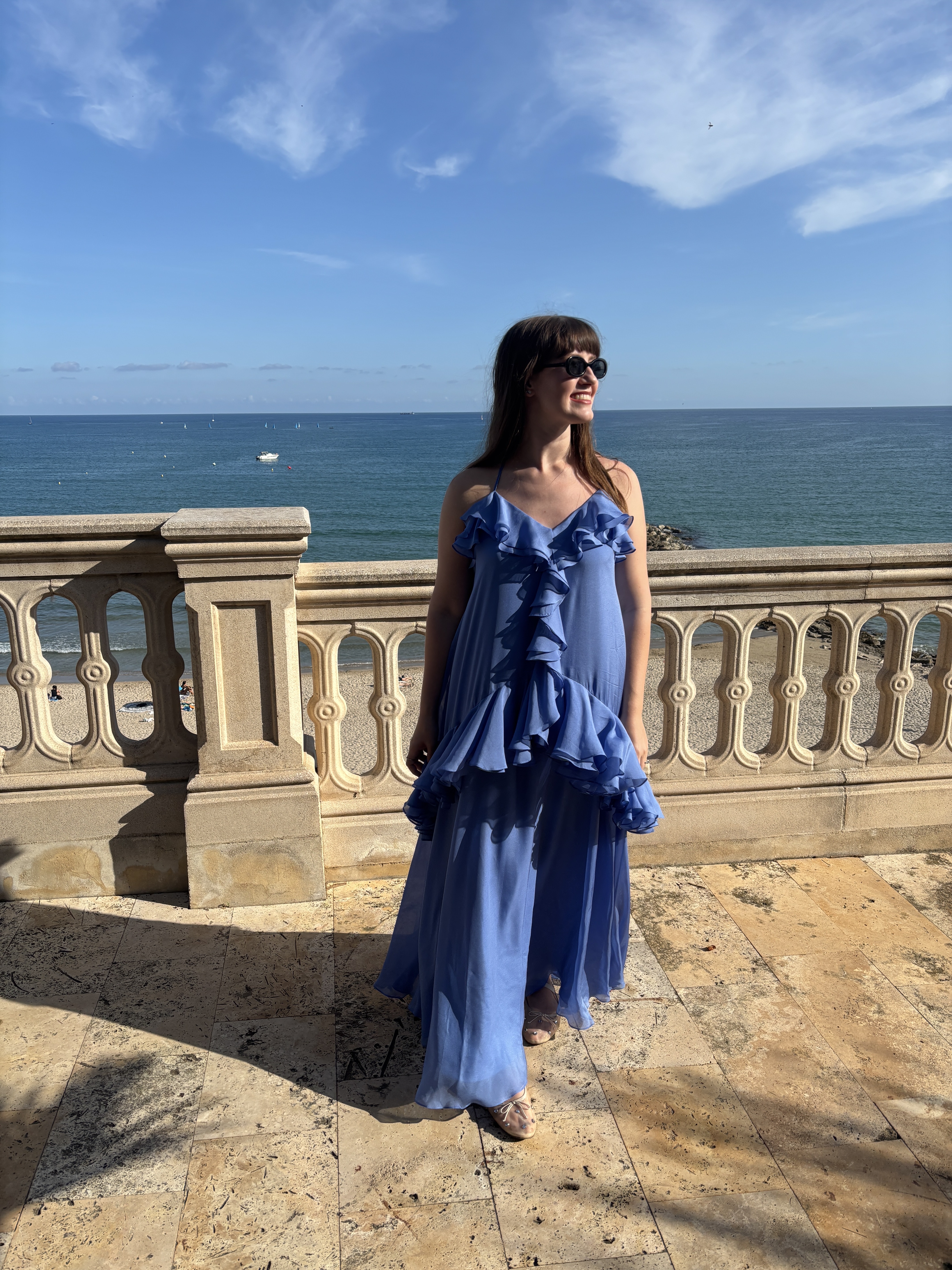 Halie LeSavage wearing a dress in Spain