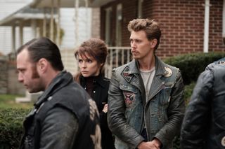 jodie comer and austin butler as kathy and benny in the bikeriders