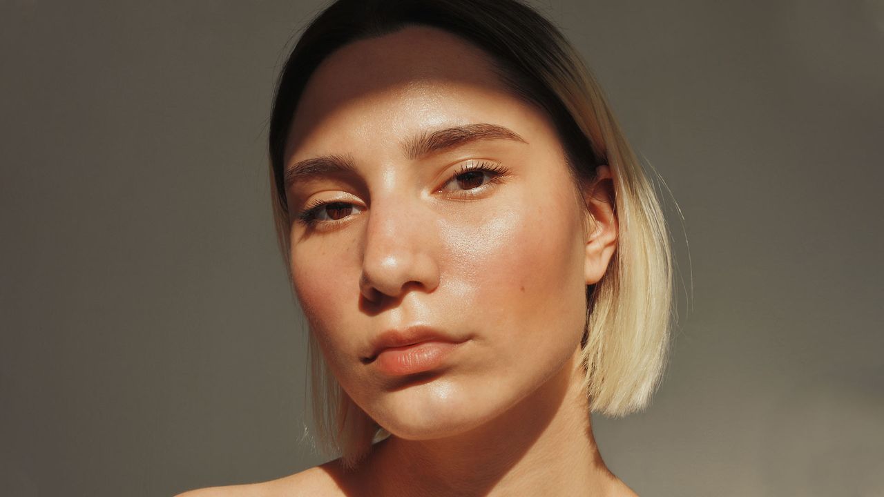 Young woman with glowing skin