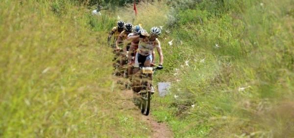 Philip Buys from Team Garmin leads a group of riders to the feedzone