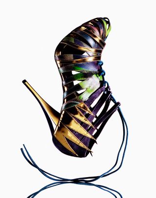 designer high heel with straps and laces with effervescent effect