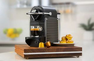 Nespresso pod coffee maker in kitchen