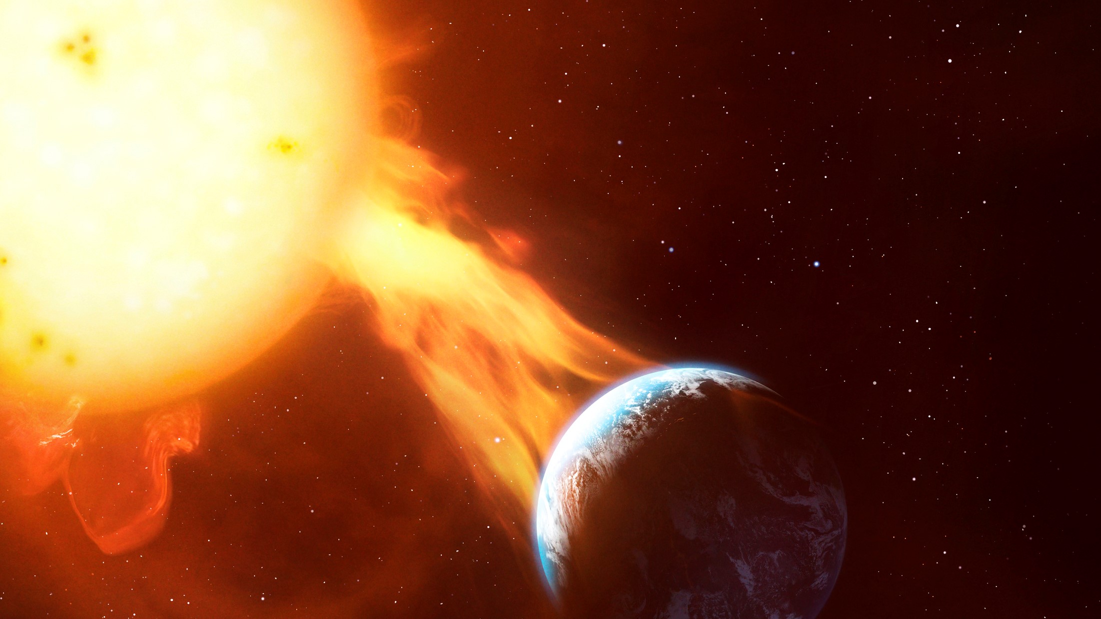 A large fiery flare from the sun is hitting Earth.