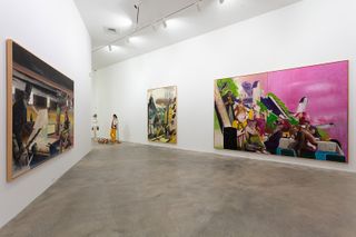 Large colourful artwork on white walls