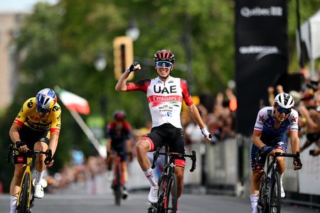 MONTREAL QUEBEC SEPTEMBER 11 Tadej Pogacar of Slovenia and UAE Team Emirates celebrates winning ahead of Wout Van Aert of Belgium and Team Jumbo Visma Andrea Bagioli of Italy and Team QuickStep Alpha Vinyl during the 11th Grand Prix Cycliste de Montreal 2022 a 221km one day race from Montreal to Montreal GPCQM WorldTour on September 11 2022 in Montreal Quebec Photo by Dario BelingheriGetty Images