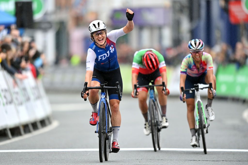 WELSHPOOL WALES JUNE 09 Grace Brown of Australia and Team FDJ Nouvelle Aquitaine Futuroscope celebrates winning ahead of Katarzyna Niewiadoma of Poland and Team CanyonSram Racing and Elisa Longo Borghini of Italy and Team Trek Segafredo during the 8th The Womens Tour 2022 Stage 4 a 1447km from Wrexham to Welshpool WomensTour UCIWWT on June 09 2022 in Welshpool Wales Photo by Justin SetterfieldGetty Images