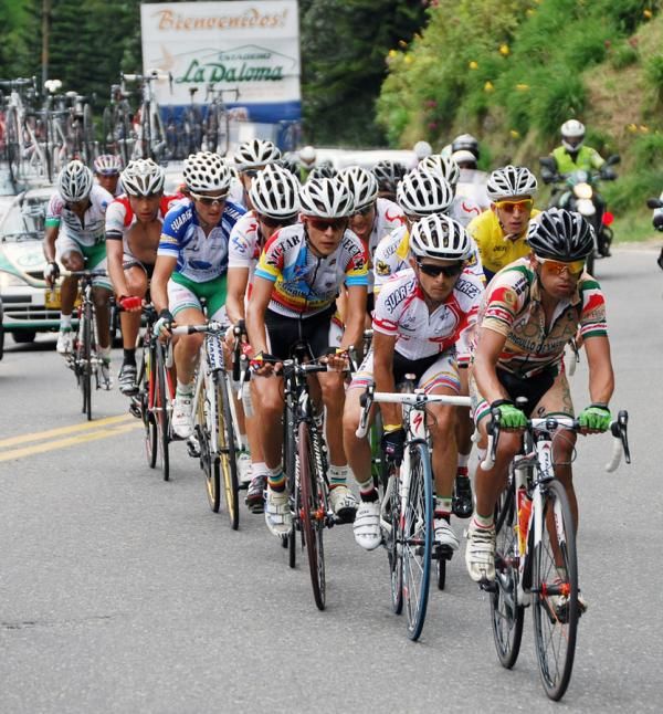 Fernando Camargo (Boyaca Orgullo de America) rides ahead of Jose Rujano.