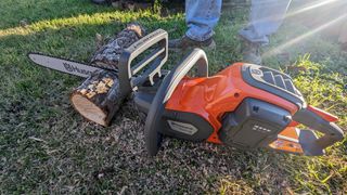 The chainsaw cut through small and medium-sized logs without any effort at all.