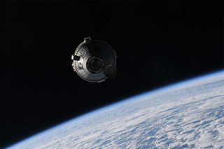 The Starliner OFT-2 capsule is stunning in these docking pictures by the station's crew.