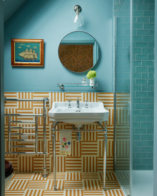 colourful bathroom in blue with yellow pattern tiles