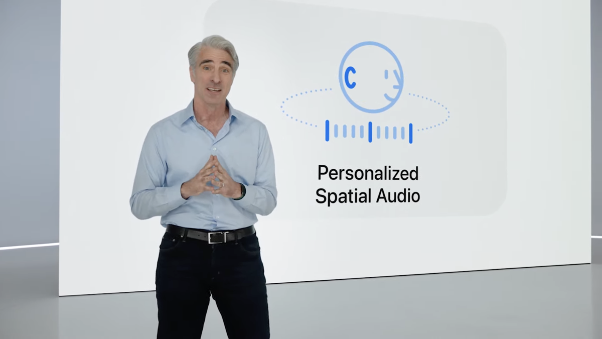 Craig Federighi standing in front of sign saying Personalized Spatial Audio