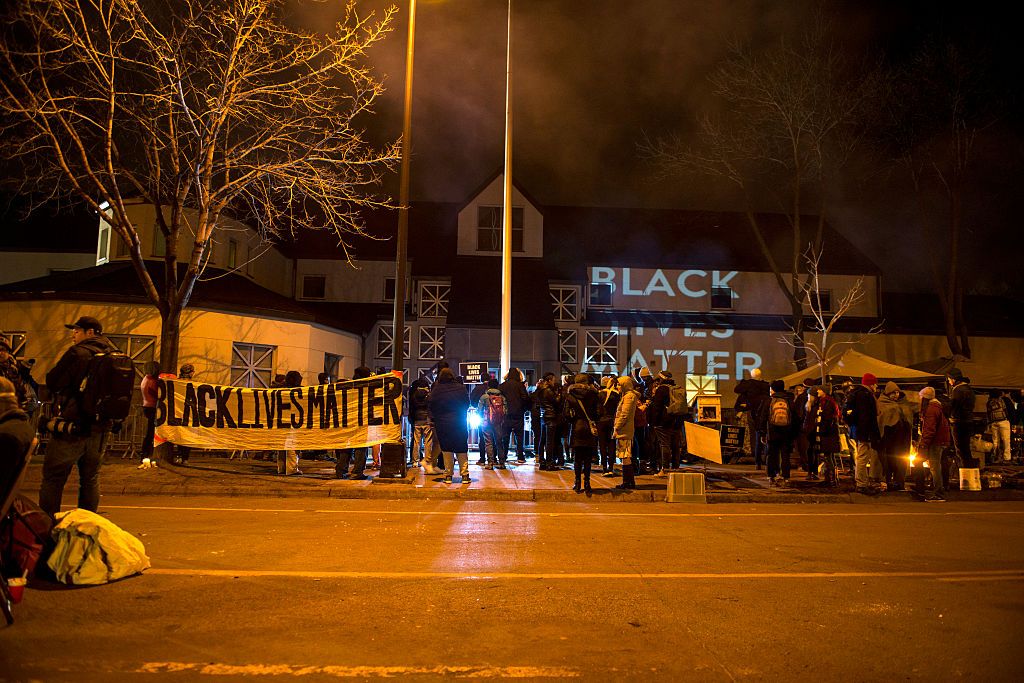 Protesters near Minneapolis Police Department&amp;#039;s 4th precinct camp out to highlight death of Jamar Clark