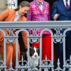 Princess Isabella of Denmark, Queen Margrethe of Denmark, King Frederik X of Denmark, Prince Vincent of Denmark, Princess Josephine of Denmark, Queen Mary of Denmark and their dog on the balcony for Frederik's birthday