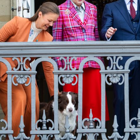 Princess Isabella of Denmark, Queen Margrethe of Denmark, King Frederik X of Denmark, Prince Vincent of Denmark, Princess Josephine of Denmark, Queen Mary of Denmark and their dog on the balcony for Frederik's birthday