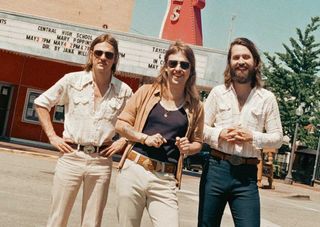 DeWolff standing in the street in Muscle Shoals