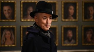 Alan Cumming in a black hat in The Traitors US