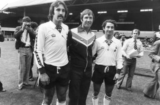 Tottenham manager Keith Burkinshaw welcomes new signings Ricardo Villa (left) and Osvaldo Ardiles (right) in July 1978.