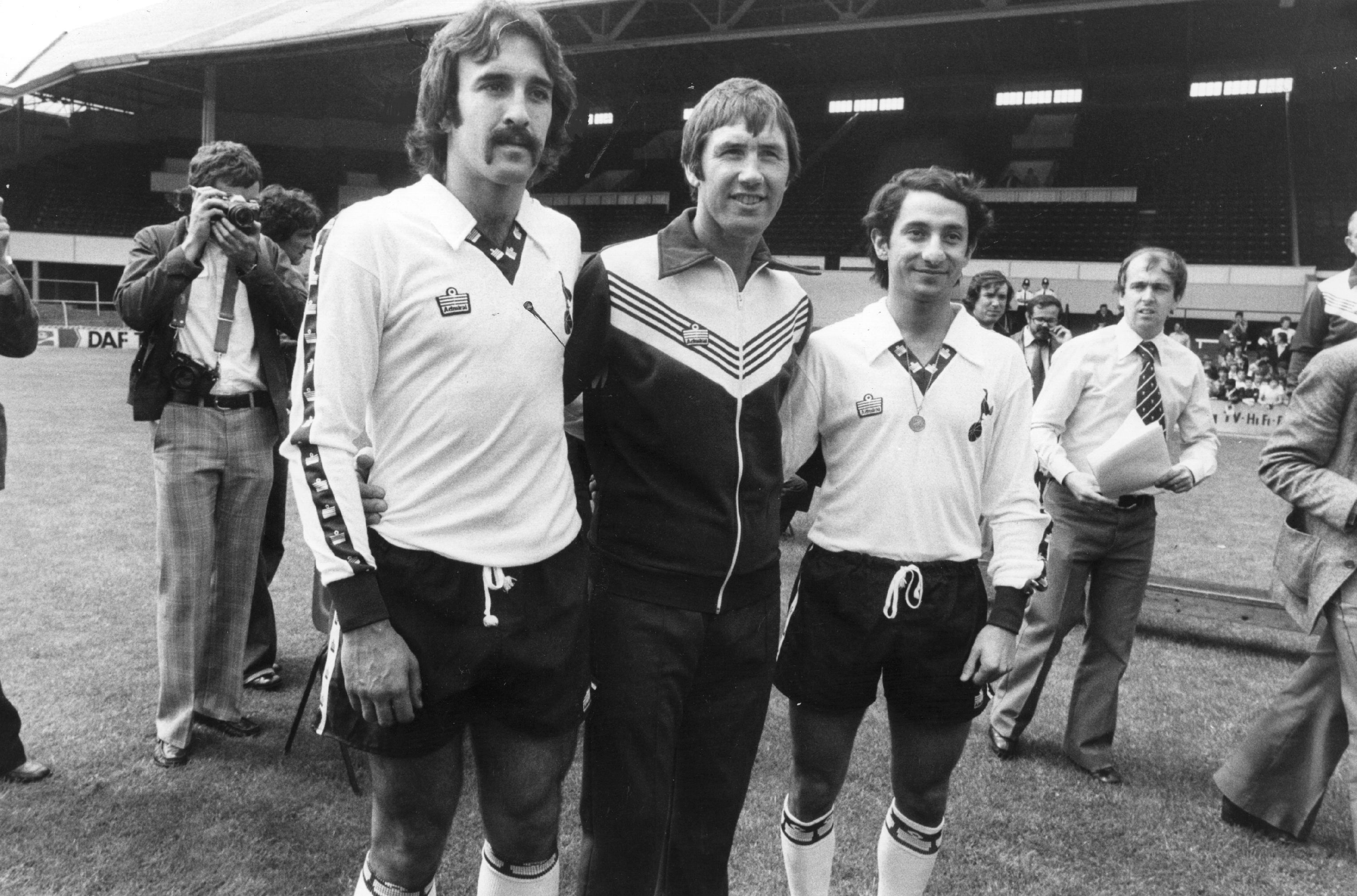 Tottenham manager Keith Burkinshaw welcomes new signings Ricardo Villa (left) and Osvaldo Ardiles (right) in July 1978.