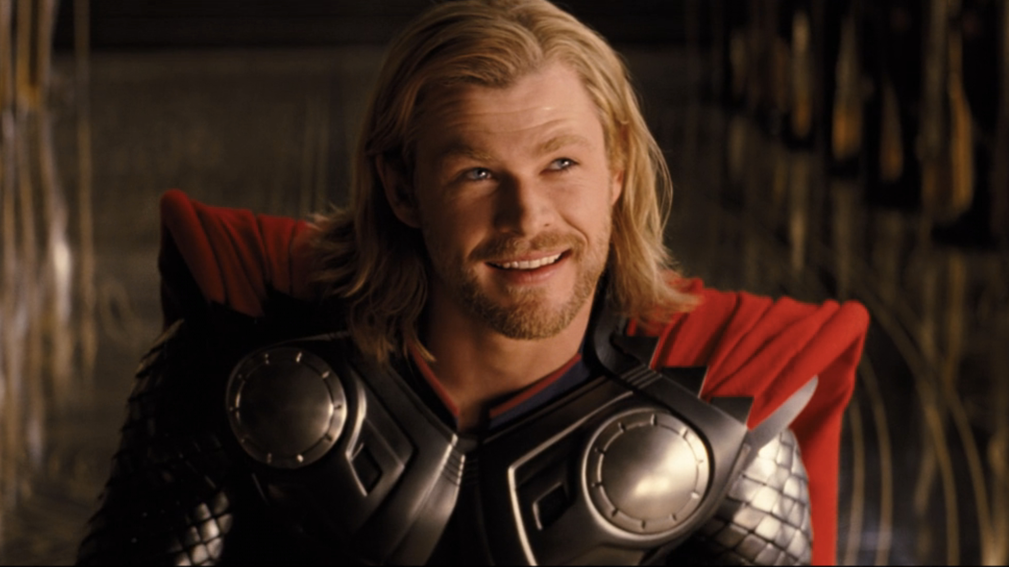 Thor (Chris Hemsworth) smiles in Thor.