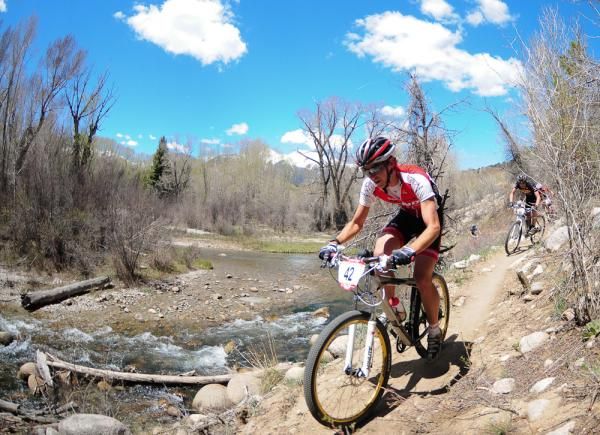Colin Cares (Kenda/Felt) riding along Chalk Creek.