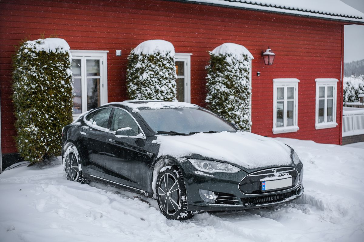 tesla on snowy driveway