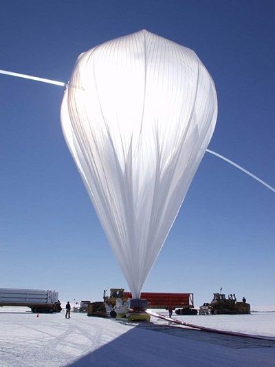 High pressure helium is used to inflate the balloon that will carry X-Calibur high into the atmosphere. This photo of the balloon was taken during a previous mission in Antarctica.