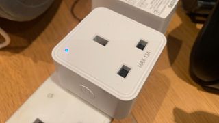 WiZ Smart Plug, plugged in and powered on